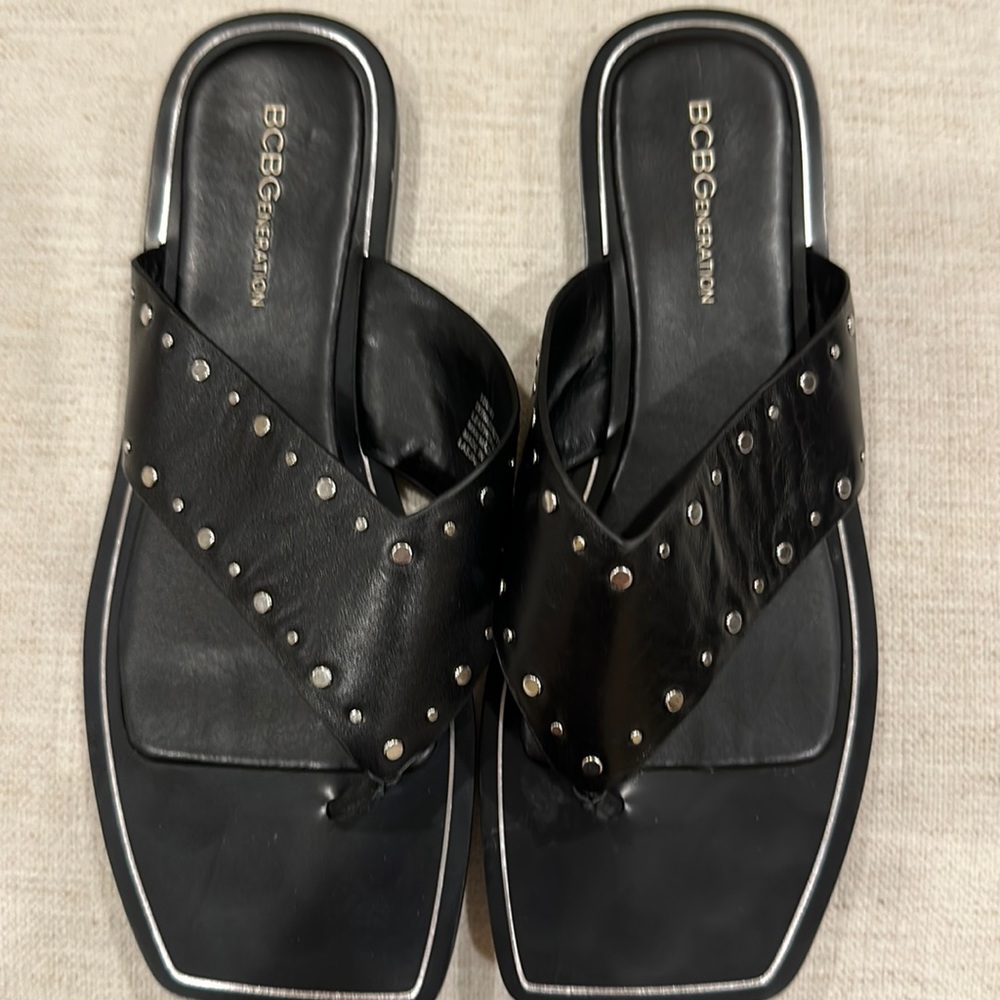 BCBGeneration black leather flat slides - size 10